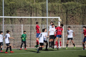 Infantil A del Aspe UD en un corner